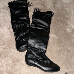 Over the knee black leather boots